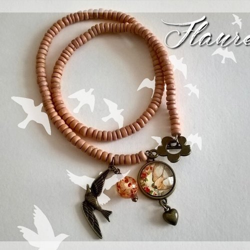 Bracelet bois  et cabochon "hirondelle"