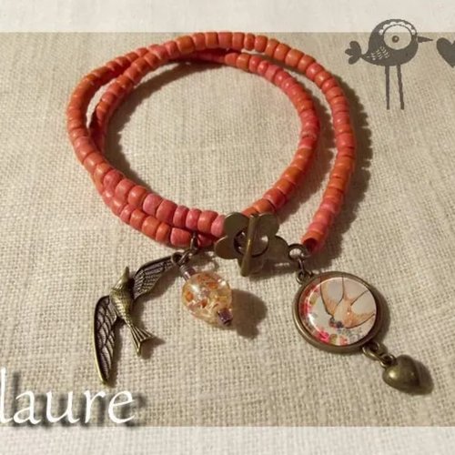 Bracelet en bois orange et cabochon "hirondelle"