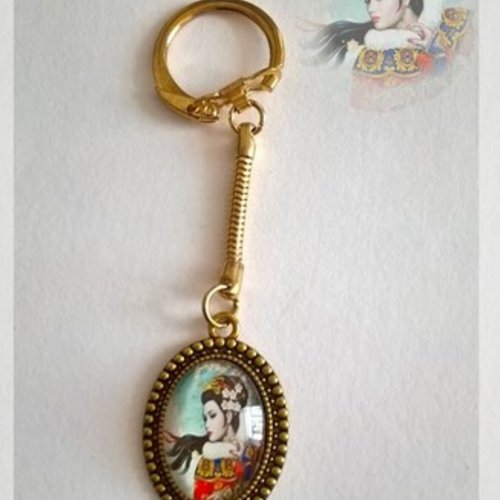 Porte-clefs doré "princesse des neiges"