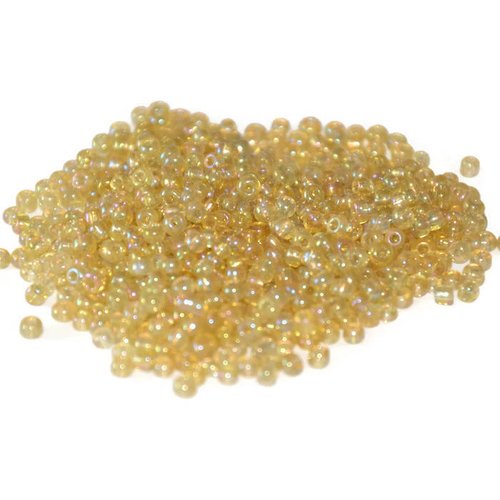 10gr perles de rocaille jaune clair reflets arc en ciel en verre  2mm environ 800 perles (ref25)