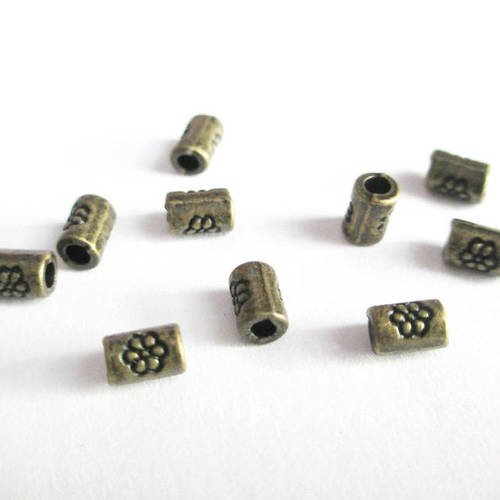 10 perles intercalaire  tube en métal 5mm motif fleur couleur bronze 