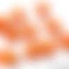 10 perles acrylique orange torsion losange 15x11x6mm 