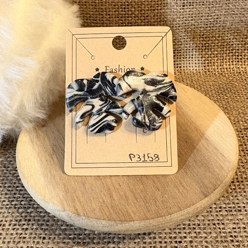 Boucle d’oreille feuille tropical