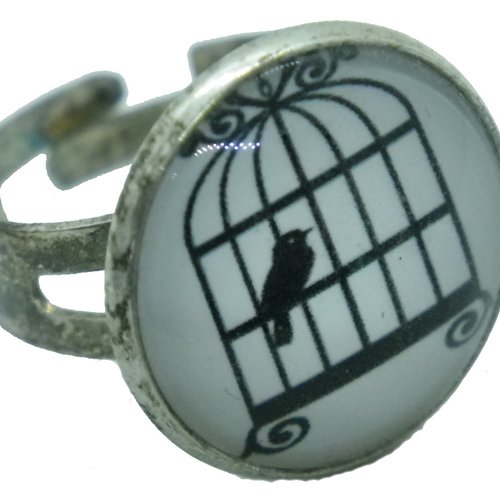 Bague argentée, noire et blanche oiseau en cage