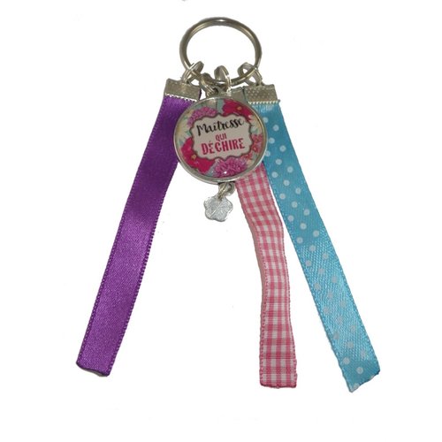Porte clés bleu, violet et rose "maîtresse qui déchire"