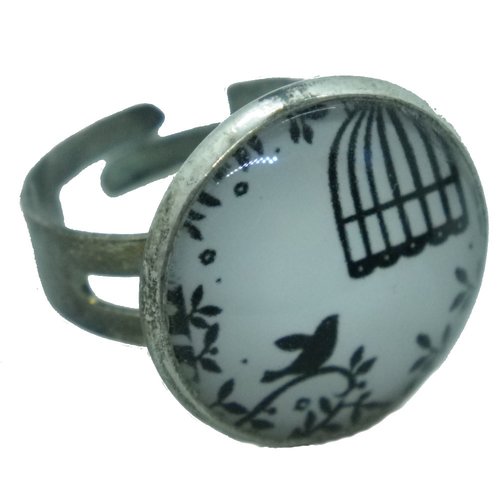 Bague argentée, noire et blanche oiseaux en cages