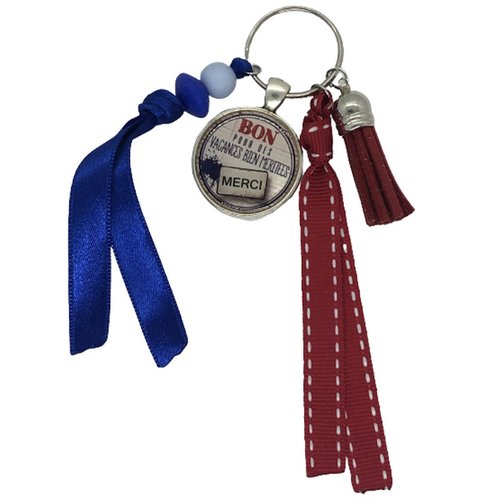 Porte clés rouge et bleu "bon pour des vacances bien méritées - merci"