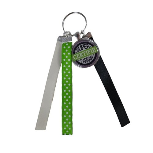 Porte clés vert, beige et noir "certifié super parrain"