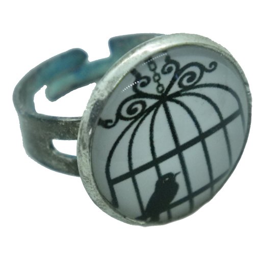 Bague argentée, noire et blanche oiseau et cage