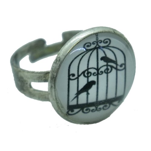 Bague argentée, noire et blanche oiseaux en cage