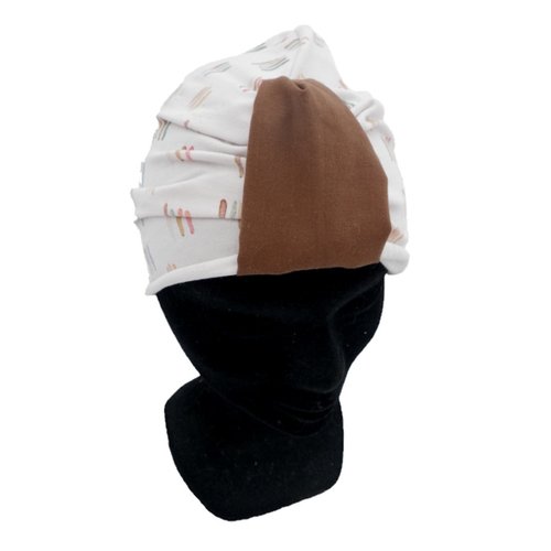 Bonnet turban de chimio crème et traits de couleur