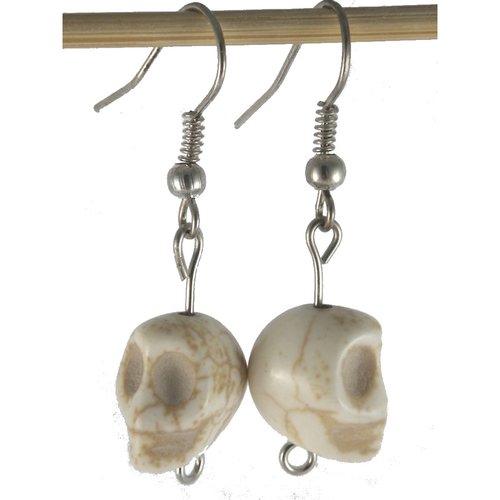 Boucles d'oreilles beiges "tête de mort"