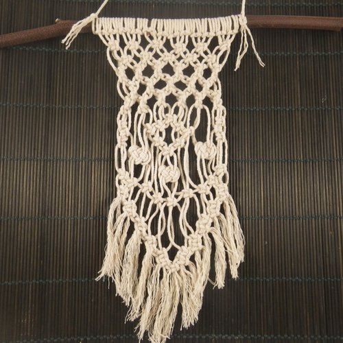Décoration murale en macramé