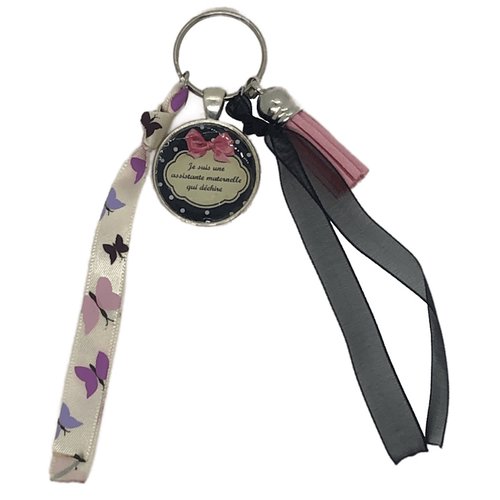 Porte clés rose et noir "je suis une assistante maternelle qui déchire"