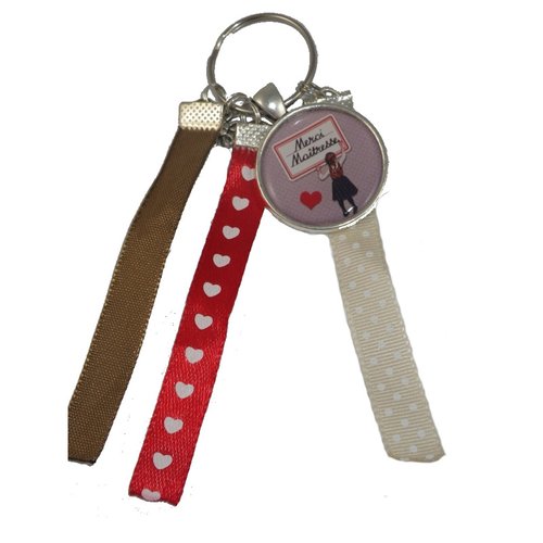 Porte clés marron et rouge "merci maîtresse"