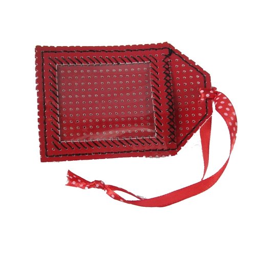 Etiquette rouge et noire en vinyle perforé pour bagages