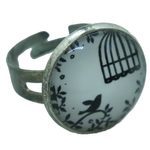Bague argentée, noire et blanche oiseau et cage