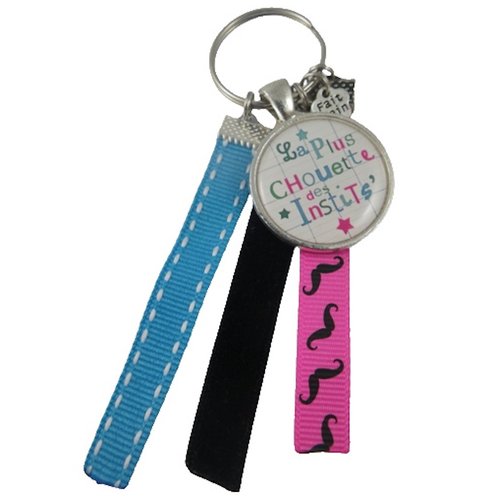 Porte clés bleu, rose et noir "la plus chouette des instits"