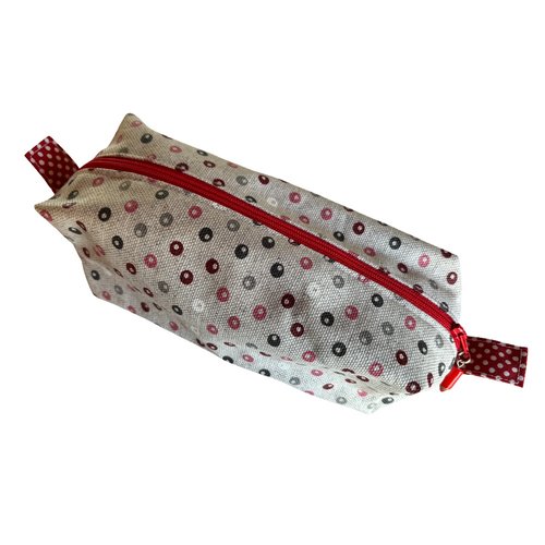 Trousse beige à pois roses, rouges et gris