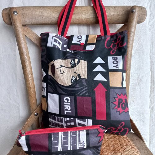 Tote bag en tissu enduit,motifs "street arts" et simili cuir rouge,sangle roue et noire port a l'épaule, trousse assortie