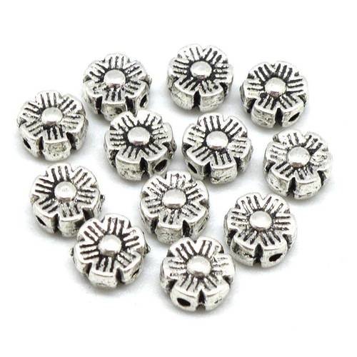 20 petites perles fleur en métal argenté  6mm
