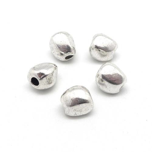 5 perles en métal argenté galets irrégulier trou 3,1mm 