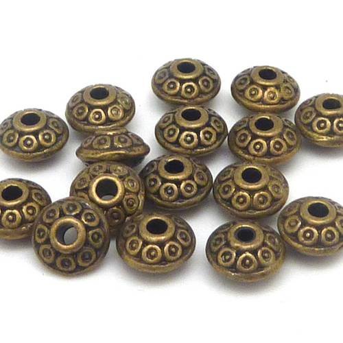 20 perles toupie 6,7mm en métal de couleur bronze gravé de petits ronds