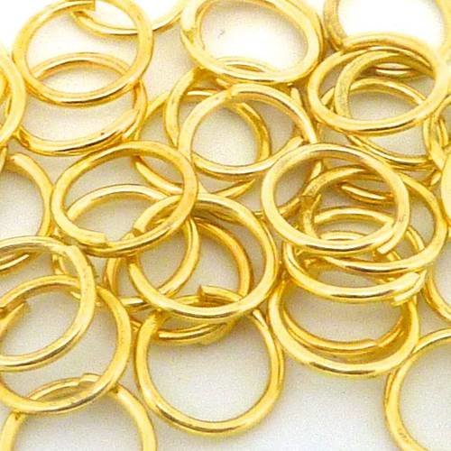 10g - environ 150 anneaux de jonction 7mm en métal doré 