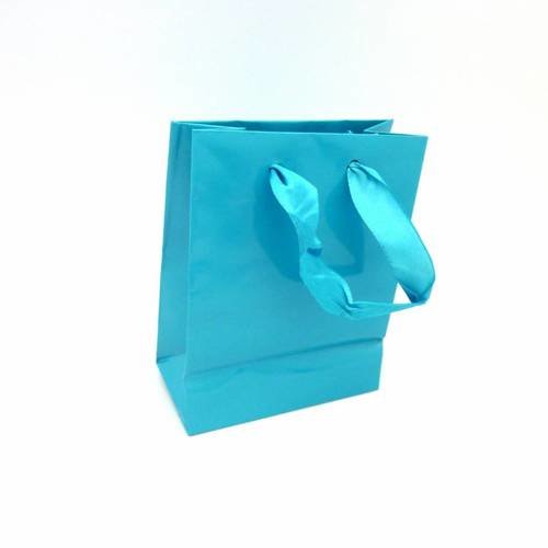 Pochette cadeaux en papier glacé bleu canard uni lanière bleu 