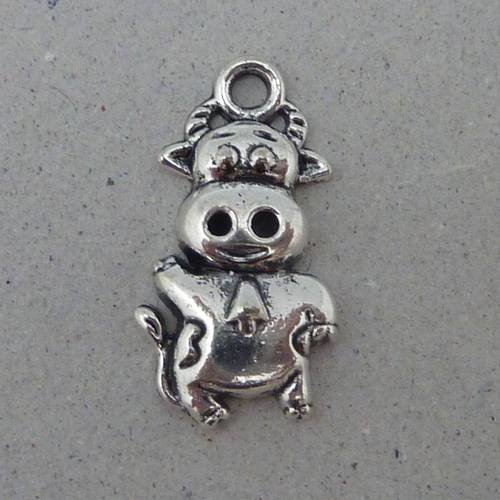 Breloque, pendentif petite vache en métal argenté