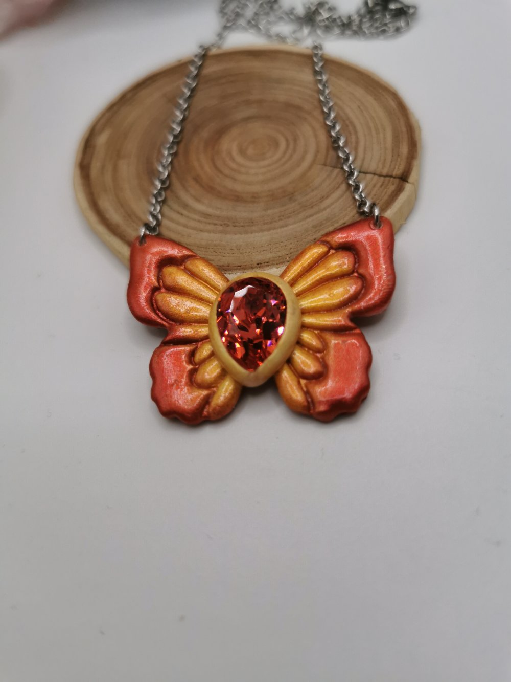 Collier papillon de feu - bijou en acier inoxydable orange / rouge et  cristal - Un grand marché