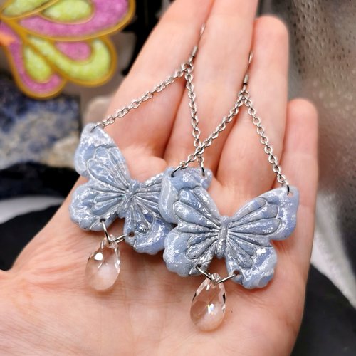 Boucles d'oreilles pendantes papillons bleus et argent - acier inoxydable