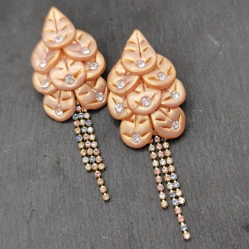 Boucles d'oreilles paon bling bling