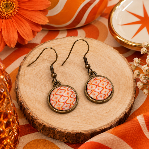 Boucles d'oreilles bronze pendantes cabochon verre motif seventies vintage orangé
