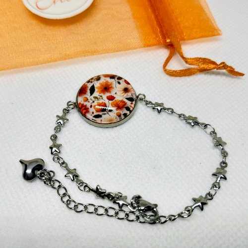 Bracelet acier inoxydable et cabochon verre motif floral orange et beige