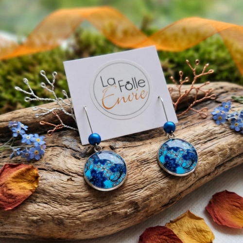 Boucles d'oreilles pendantes cabochon verre motif esprit wax bleu