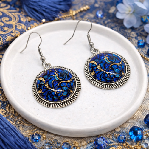 Boucles d'oreilles pendantes cabochon verre motif esprit wax bleu