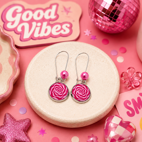 Boucles d'oreilles pendantes cabochon verre motif hypnotique rose