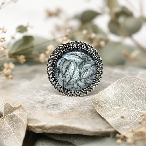Bague ajustable cabochon en verre motif feuillage