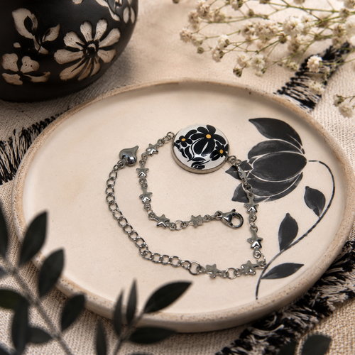 Bracelet acier inoxydable et cabochon verre motif dessin de fleurs noir et blanc