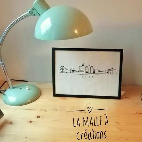 Broderie lyon style skyline dans cadre