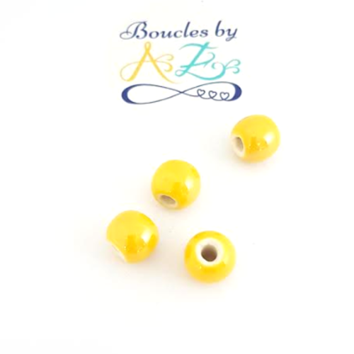 Perles jaunes en céramique 10mm x2 pja3-12.