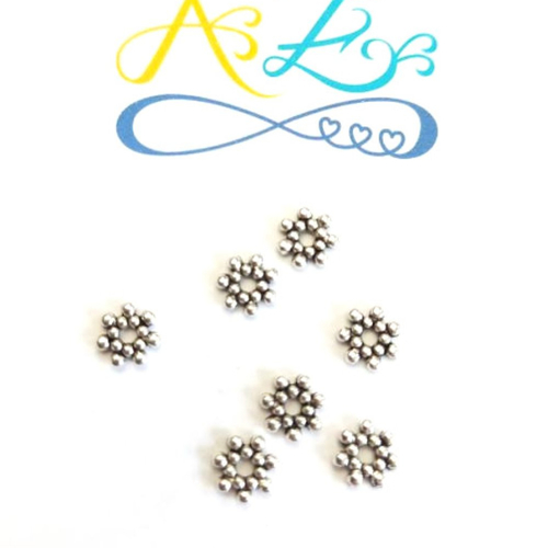Perles intercalaires fleurs argentées 7mm x30 par7-11