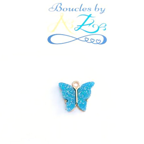 Breloque papillon turquoise 14x16mm tu8-2