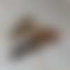 Perle tube incurvé marron marbré en acrylique 31x9mm pma1-8