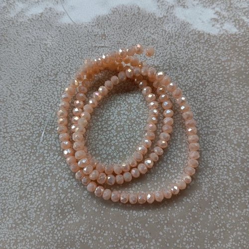 Fil de perles rondelles à facettes beige orangé en verre 4x3mm x135perles vpblc5-24