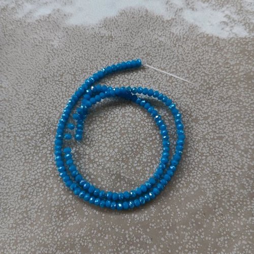Fil de perles rondelles à facettes bleues en verre 3x2mm x130perles vpble6-18