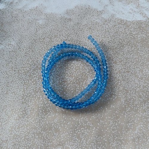Fil de perles rondelles à facettes bleues en verre 3x2mm x130perles vpble5-18