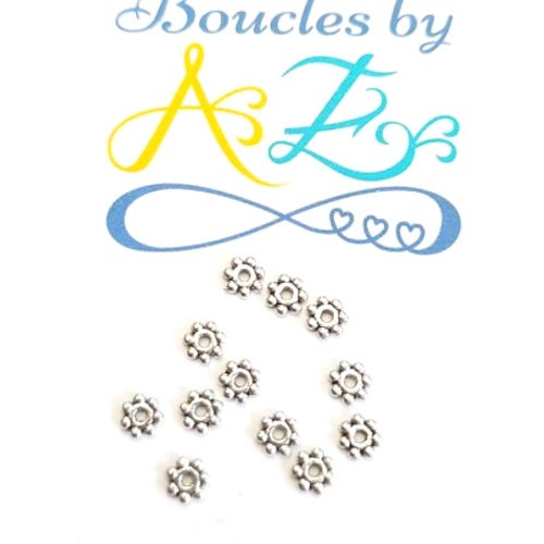 Perles intercalaires fleurs argentées 4mm x50 par7-13