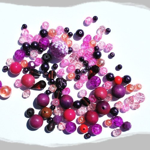 Lot de perles variées dominante rose/mauve/violet 